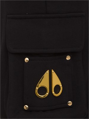 PANTALONE TUTA MOOSE KNUCKLES NERO in UOMO