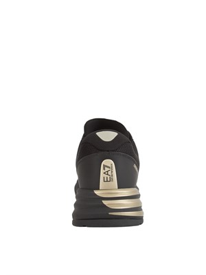Sneakers uomo nere e oro Emporio Armani in UOMO
