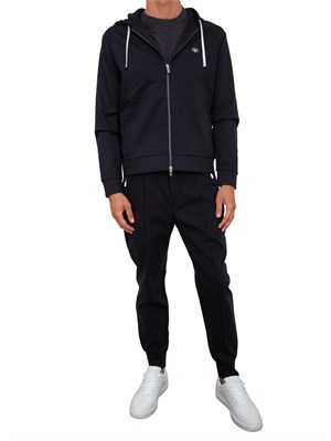 Pantaloni uomo Emporio Armani modello jogger in tessuto punto Roma blu in UOMO
