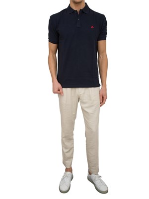 Polo in cotone piqué con logo ricamato in UOMO