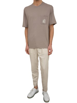 T-shirt regular fit A.X. con taschino in UOMO