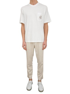 T-shirt regular fit A.X. con taschino in UOMO