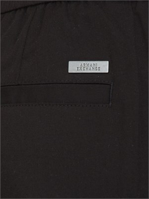 Pantaloni over a.x. nero in tessuto poly in UOMO