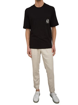T-shirt regular fit A.X. con taschino in UOMO