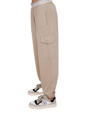 Pantaloni cargo EA7 Emporio Armani donna in tessuto tecnico beige con banda logo in DONNA