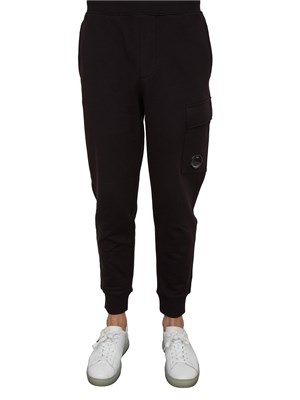 Pantaloni sportivi uomo C.P. Company in cotone nero con tasca cargo con lente in UOMO
