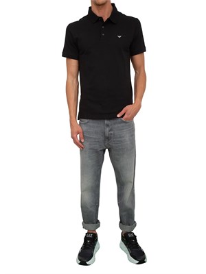Polo nera Emporio Armani uomo con patch micro logo Aquila a contrasto in UOMO