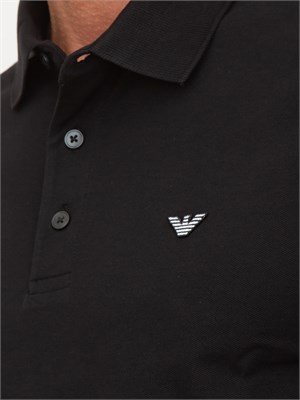 Polo nera Emporio Armani uomo con patch micro logo Aquila a contrasto in UOMO