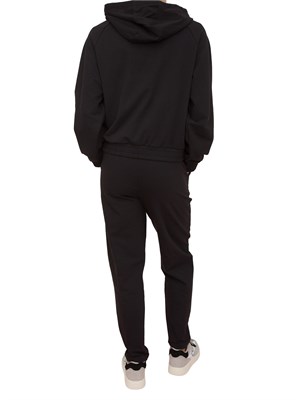 Tuta donna EA7 Emporio Armani in misto cotone e modal nero con logo metallizzato in DONNA