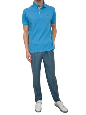 Polo azzurra Etro in cotone con dettaglio stampa floreale sul collo in UOMO