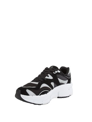 Sneaker nere Emporio Armani in suede e tessuto tecnico in UOMO