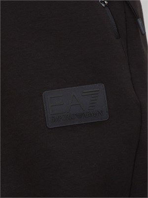 Pantalone EA7 in interlock di misto cotone nero in UOMO