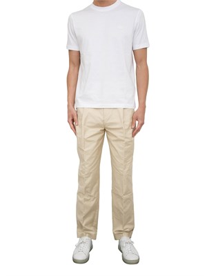 Pantaloni Hugo relaxed fit in misto cotone beige in UOMO