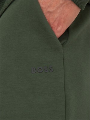 Tuta sportiva Boss verde in cotone elasticizzato con inserti a righe in UOMO