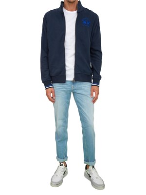 Jeans uomo Guess Jeans modello slim cinque tasche con lavaggio chiaro in UOMO