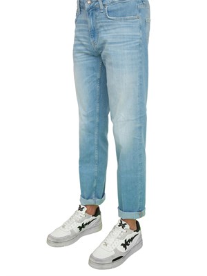 Jeans uomo Guess Jeans modello slim cinque tasche con lavaggio chiaro in UOMO
