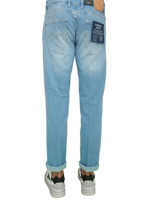Jeans uomo Guess Jeans modello slim cinque tasche con lavaggio chiaro in UOMO
