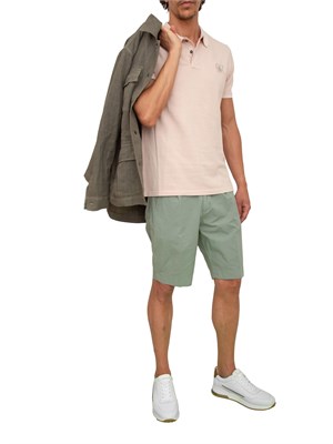 Polo uomo Guess Jeans in piquet di cotone rosa con logo ricamato in UOMO
