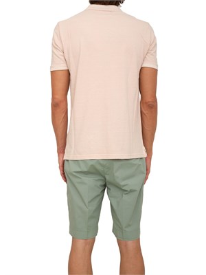 Polo uomo Guess Jeans in piquet di cotone rosa con logo ricamato in UOMO