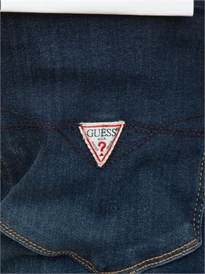 Jeans uomo slim Guess Jeans con lavaggio scuro effetto used in UOMO