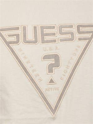 T-shirt uomo Guess Jeans in cotone beige con maxi logo davanti in UOMO