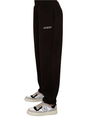 Pantalone jogger nero Guess Jeans donna con logo strass in DONNA