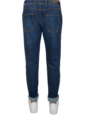 Jeans blu Corneliani uomo con lavaggio scuro ed  effetto used in UOMO