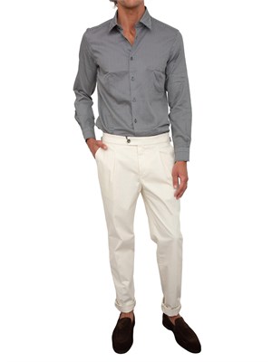 Camicia uomo Emporio Armani in cotone blu con logo aquila stampato all over in UOMO