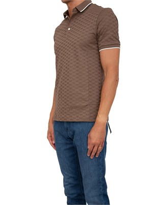 Jeans uomo slim fit Emporio Armani con vita bassa e lavaggio blu medio in UOMO