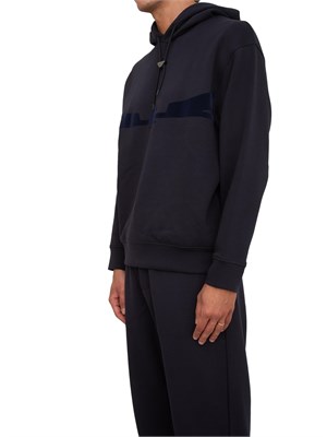 Felpa uomo blu Emporio Armani con cappuccio e aquila sagomata in flock in UOMO