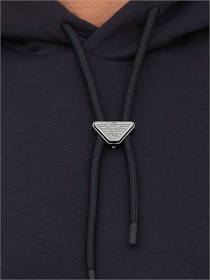 Felpa uomo blu Emporio Armani con cappuccio e aquila sagomata in flock in UOMO
