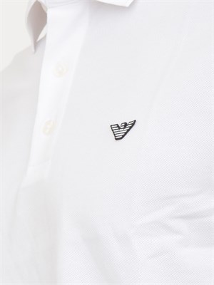Polo bianca Emporio Armani uomo con patch micro logo Aquila a contrasto in UOMO