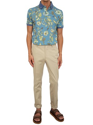 Polo Etro azzurro con motivo floreale in UOMO