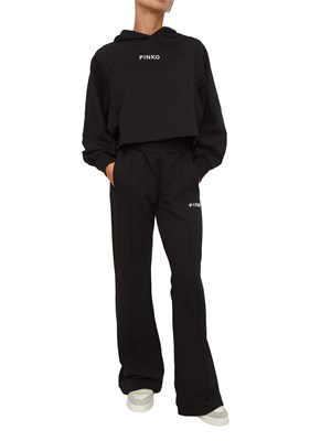 Pantaloni jogger Pinko modello flare in morbido cotone nero e logo a contrasto in DONNA