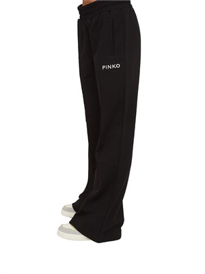 Pantaloni jogger Pinko modello flare in morbido cotone nero e logo a contrasto in DONNA