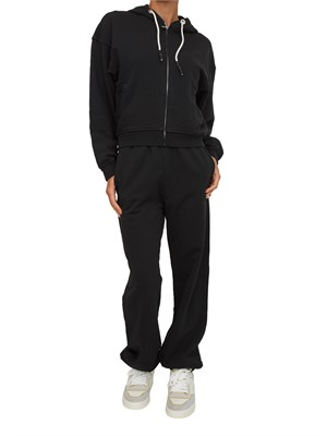Pantaloni jogger Pinko in cotone nero effetto old con logo in tono in DONNA