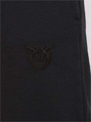 Pantaloni jogger Pinko in cotone nero effetto old con logo in tono in DONNA