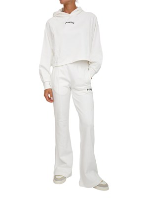 Pantaloni jogger Pinko modello flare in morbido cotone bianco e logo a contrasto in DONNA