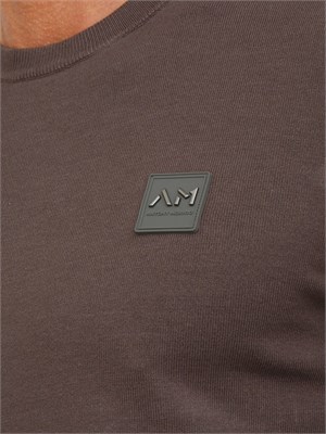 Maglia Antony Morato slim fit in misto viscosa verde con patch logata in UOMO