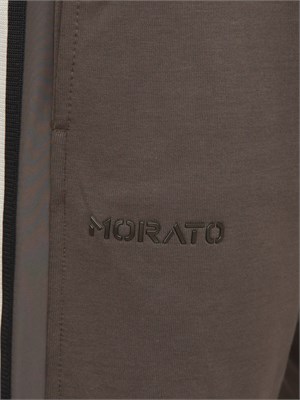 Pantaloni tuta Antony Morato in misto cotone interlock verde militare con bande laterali in UOMO