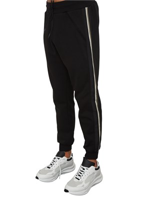 Pantaloni tuta Antony Morato in misto cotone interlock nero con bande laterali in UOMO