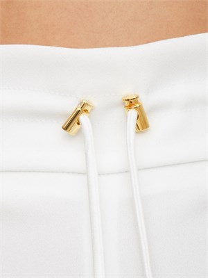 Pantaloni Elisabetta Franchi in crêpe avorio con coulisse in DONNA