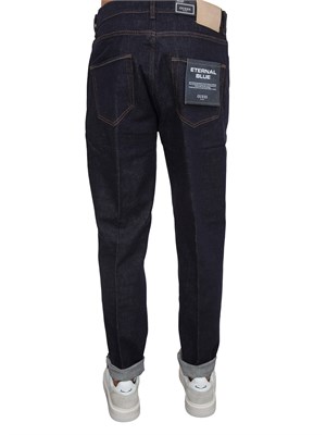 Jeans Guess Jeans uomo in denim blu scuro relaxed slim in UOMO