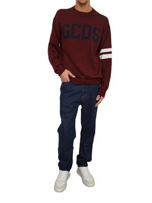 Jeans uomo GCDS lavaggio blu e logo retro in UOMO