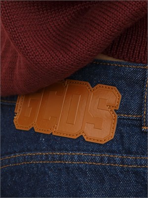 Jeans uomo GCDS lavaggio blu e logo retro in UOMO