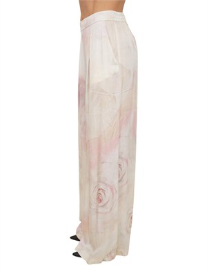 Pantaloni Blugirl in viscosa rosa con stampa rose in tono in DONNA