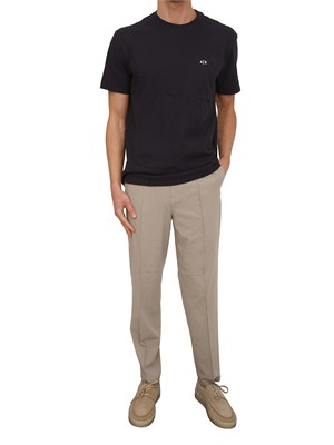Pantaloni Armani Exchange uomo in tessuto stretch beige in UOMO