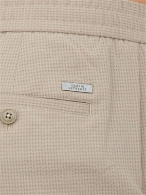 Pantaloni Armani Exchange uomo in tessuto stretch beige in UOMO