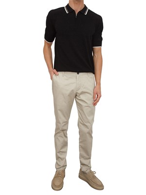 Polo in maglia Armani Exchange nero profili a contrasto in UOMO