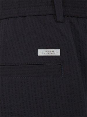 Pantaloni Armani Exchange uomo in tessuto blu in UOMO